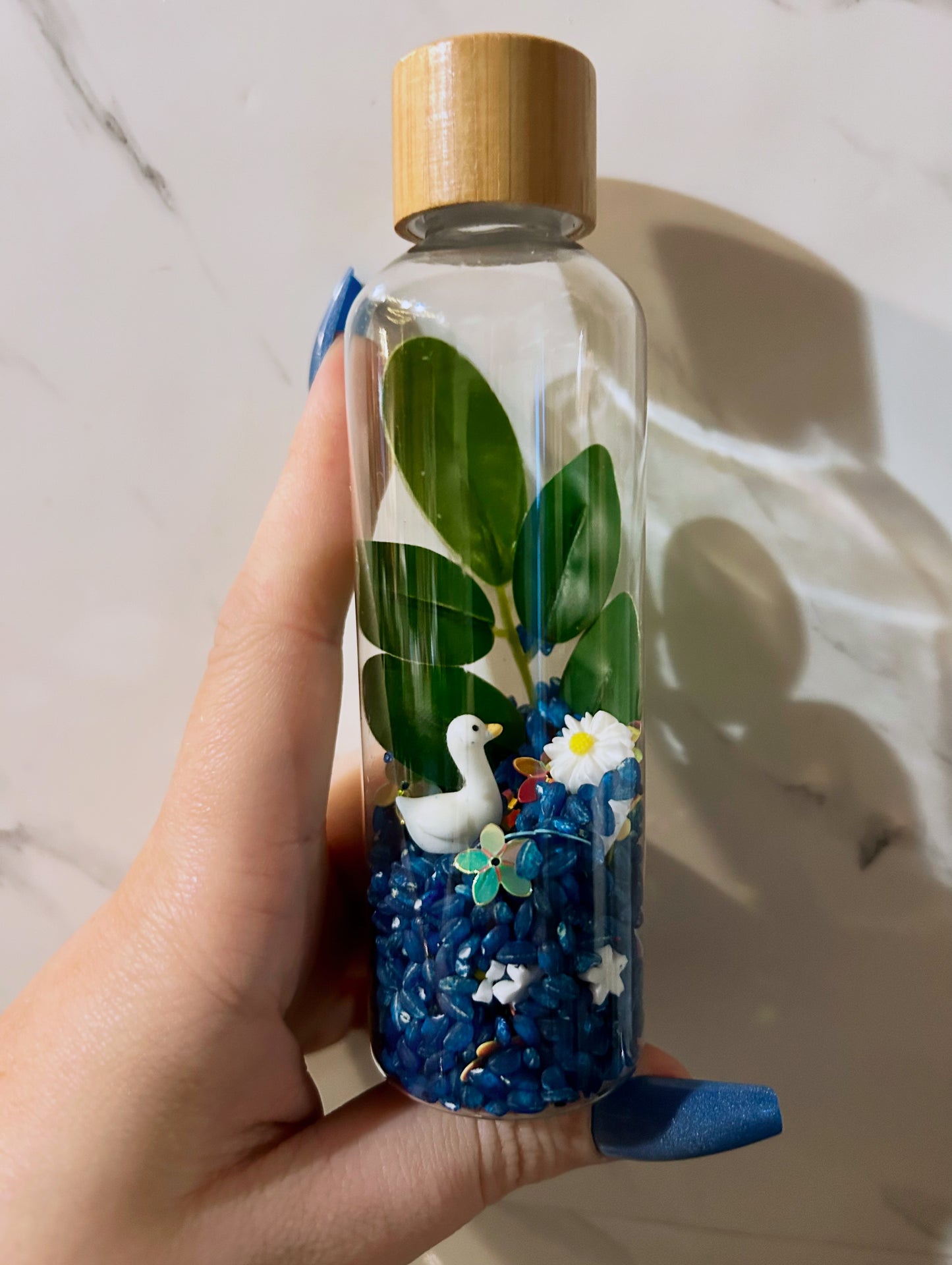 Bouteille sensorielle : Olia la petite oie