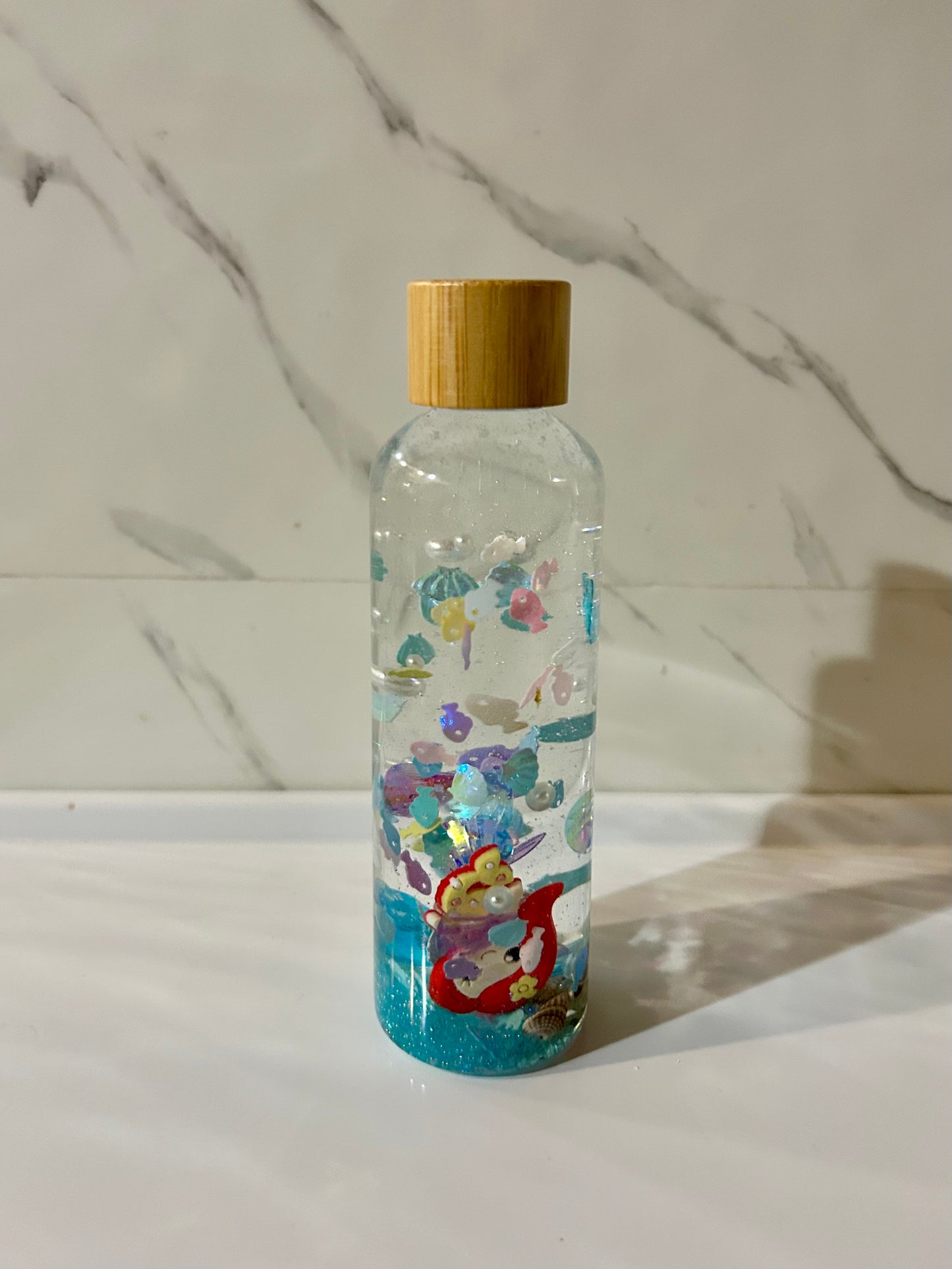 Bouteille sensorielle : Perles de l’océan