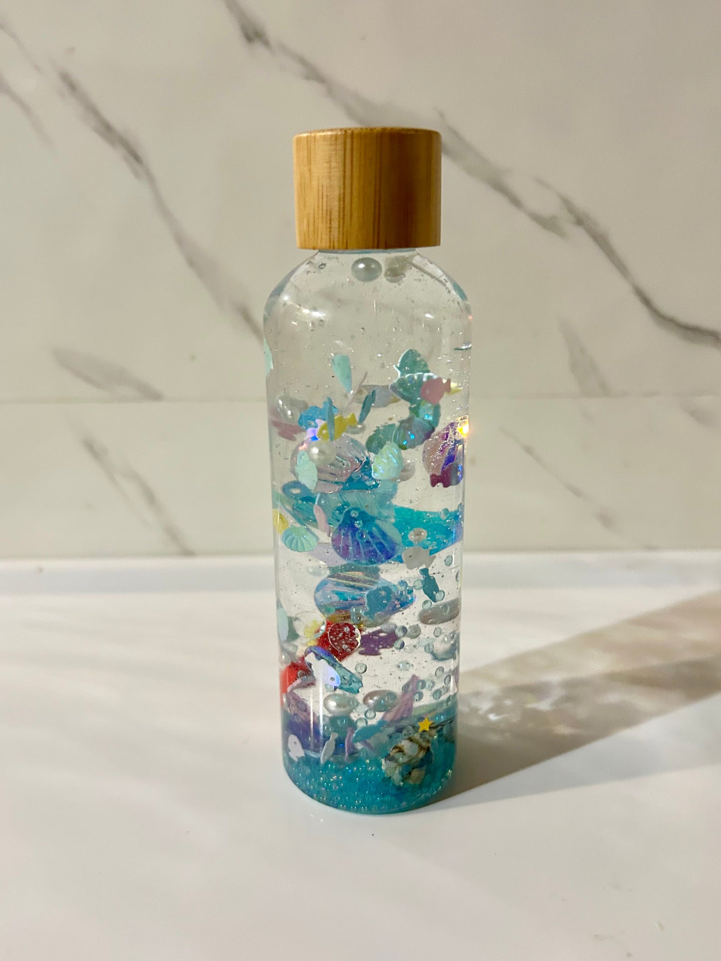 Bouteille sensorielle : Perles de l’océan
