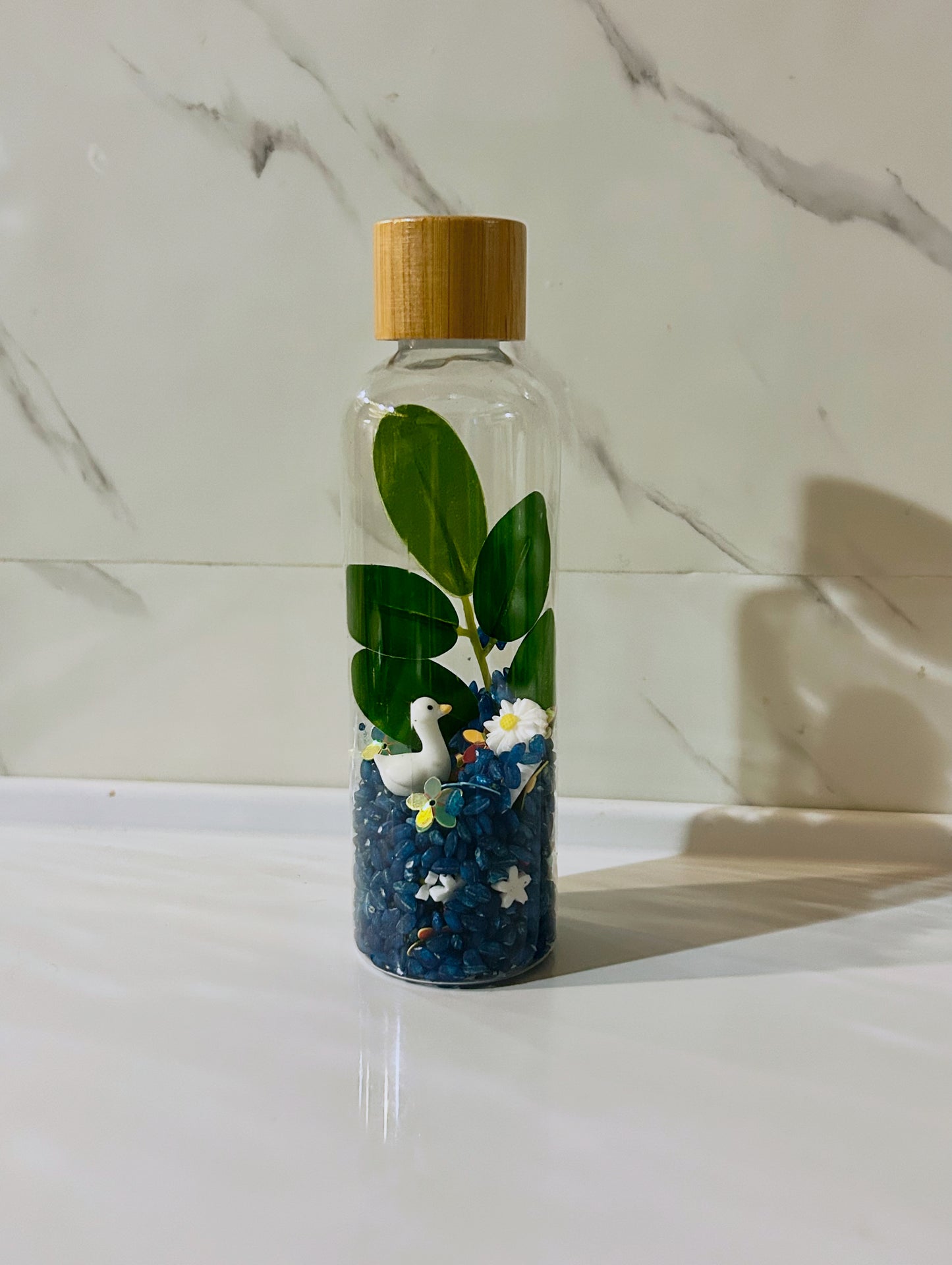 Bouteille sensorielle : Olia la petite oie