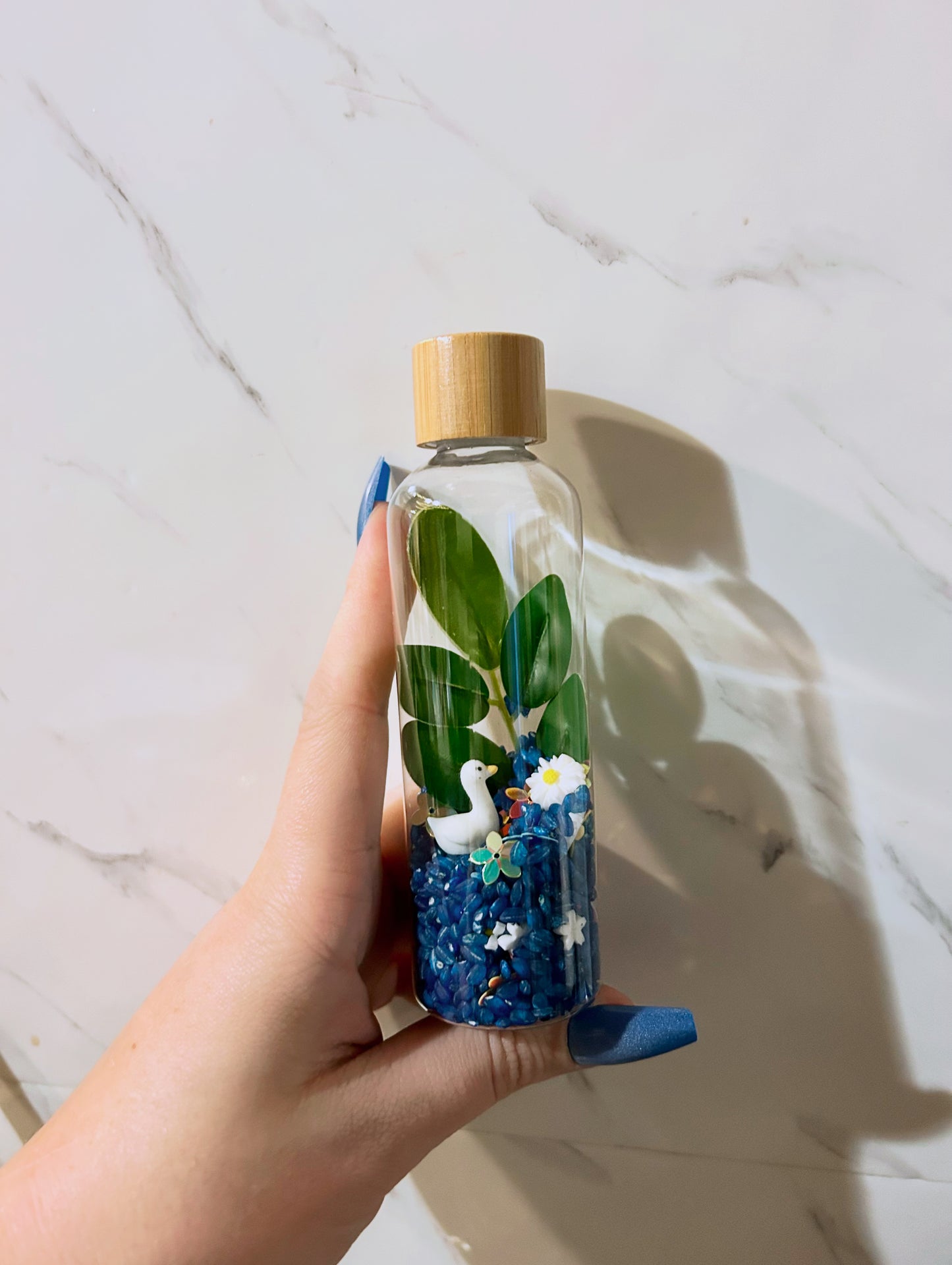 Bouteille sensorielle : Olia la petite oie